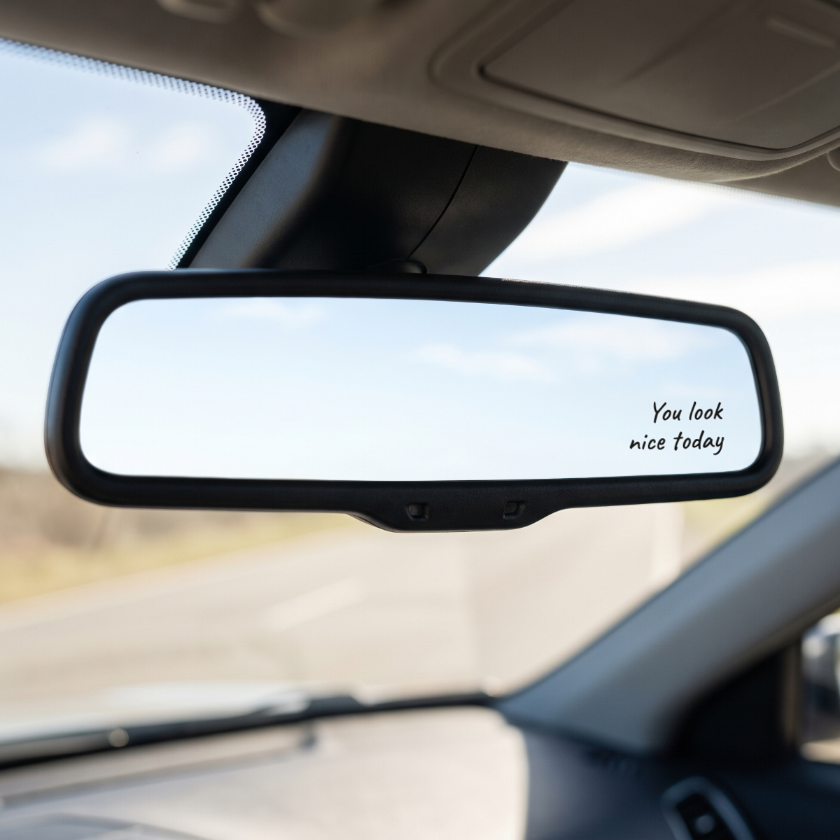 You Look Nice Today — Stickatude white-script rearview mirror decal on the mirror glass