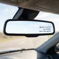 Objects In Mirror Are Dumber Than They Appear — Stickatude white-script rearview mirror decal on the mirror glass